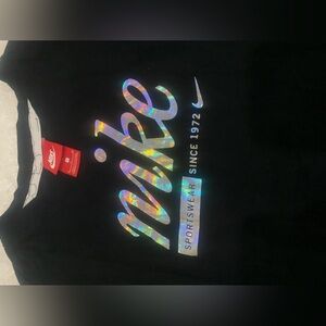 Authentic Nike top , slightly worn